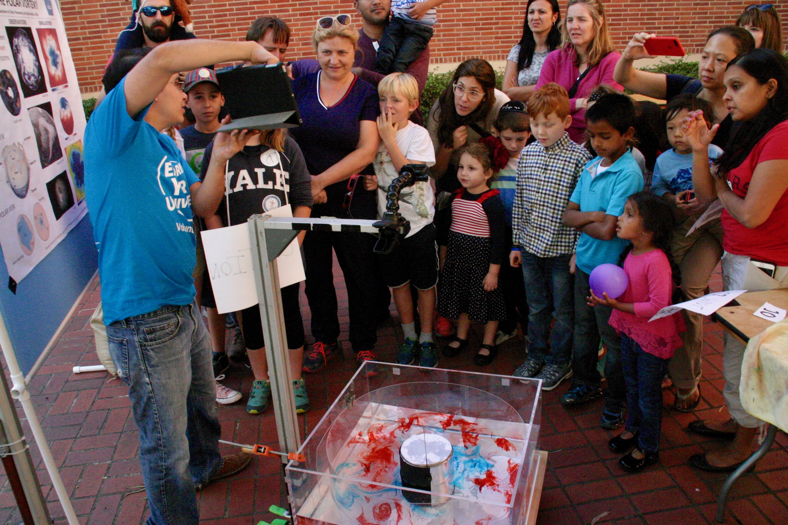 Juan leading a demonstration at EYU