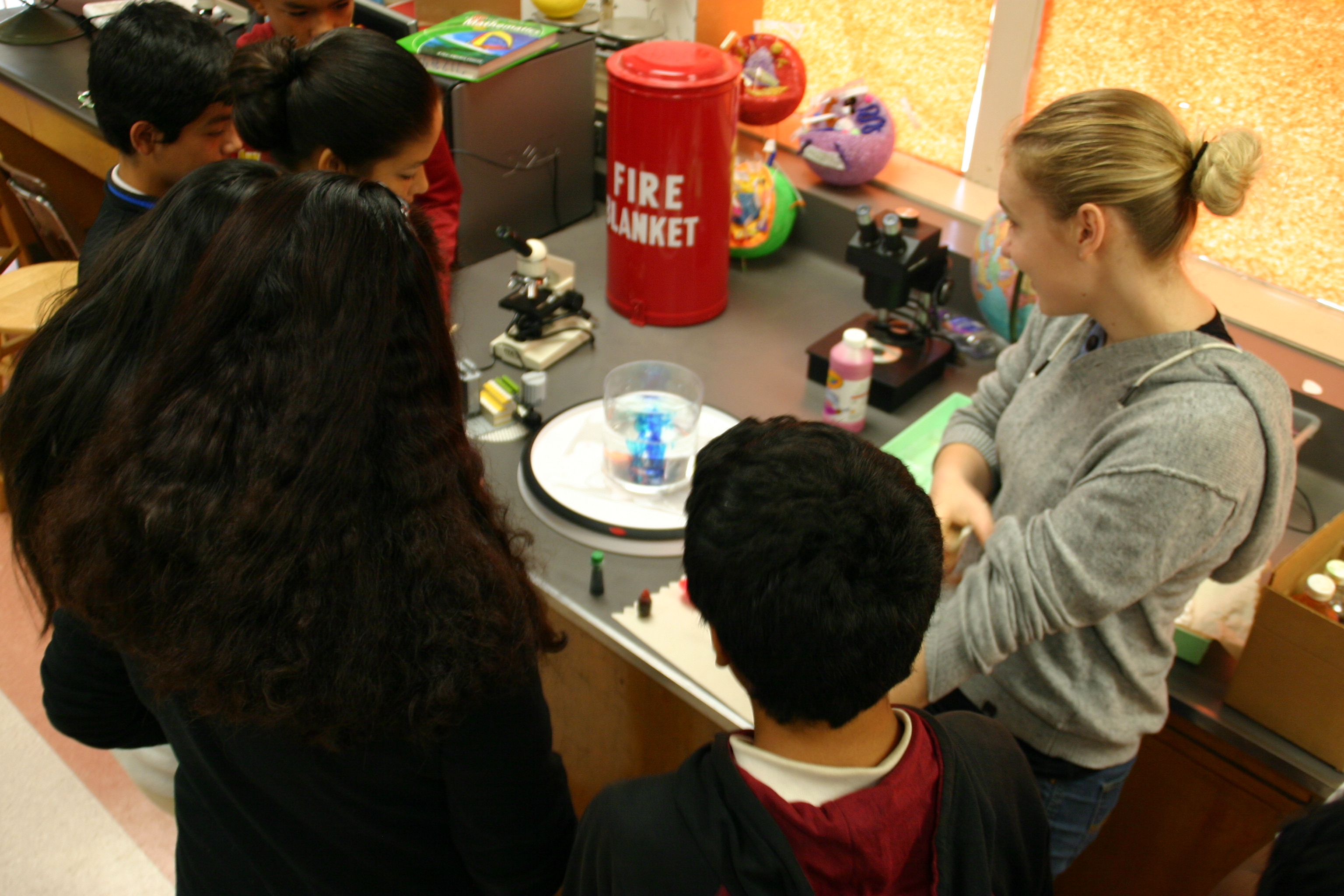 Teaching basics of rotating fluid at a middle school